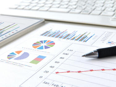 Business chart and pen with no person